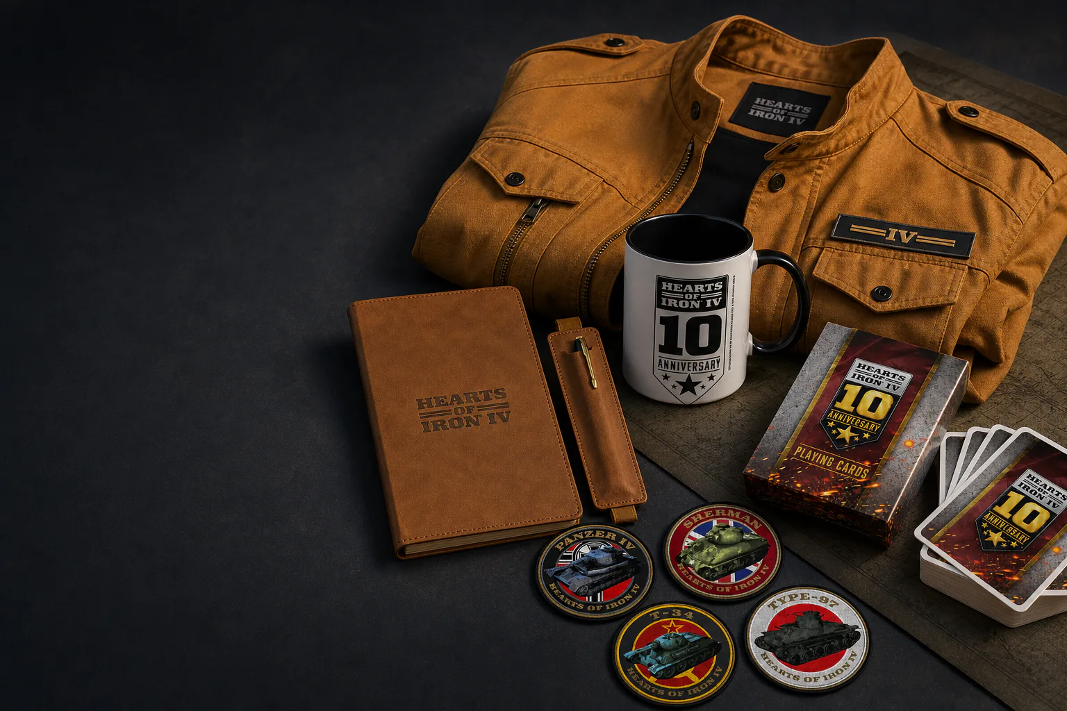Hearts of Iron merchandise range including a bomber jacket, mug, notebook, playing cards and embroidered patches